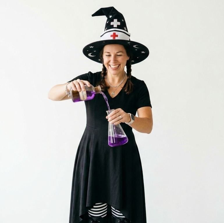 Nurse In a Witch Costume With Potions